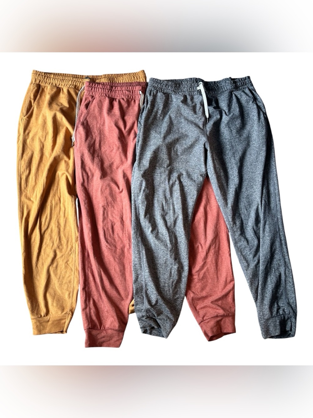 Vuori Joggers Trio in Mustard, Rust, and Heather Gray